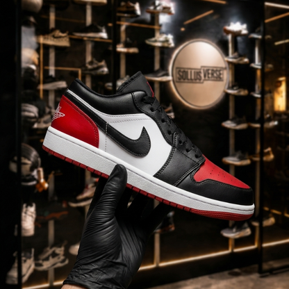 Baskets Air 1 Low Bred Toe pour Homme
